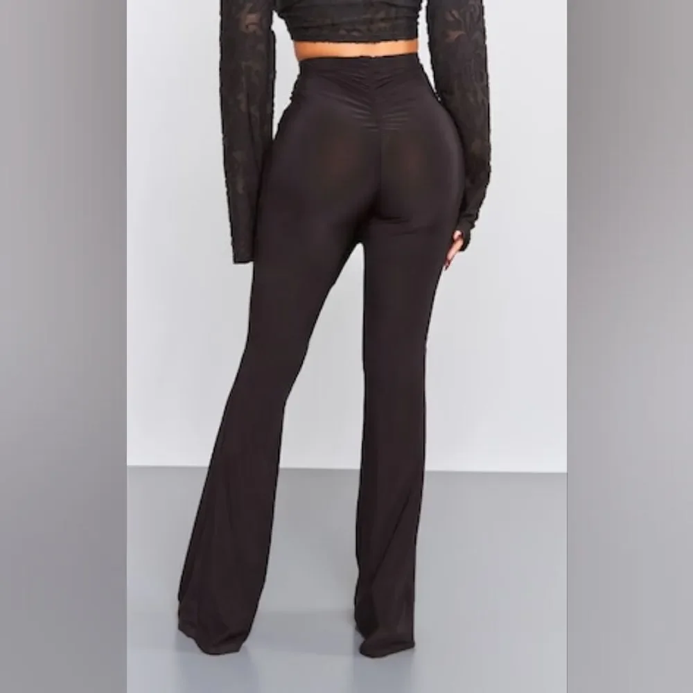 PrettyLittleThing Petite Black Flare Ruched Bum Slinky Pants Size 6 in black NWT
